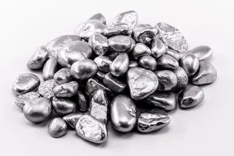 Various rough silver nuggets on black background, texture of silvery stones. Stock Photos