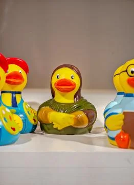 Various rubber ducks, close-up plastic bath ducks with Mona Lisa look Photos