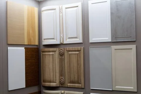 Various samples of kitchen facades in the showroom Stock Photos