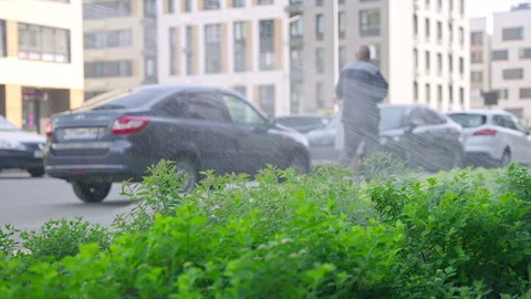 Various scenes of people interacting with water in a city environment, including Stock Footage 270213618