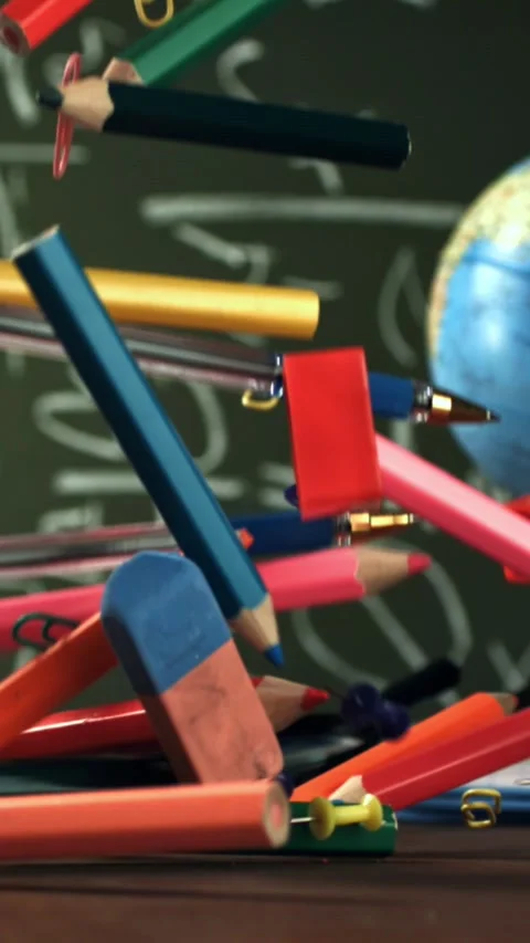 Various school tools fall on the desk. Filmed on a high-speed camera at 1000 fps Stock Footage 335365111