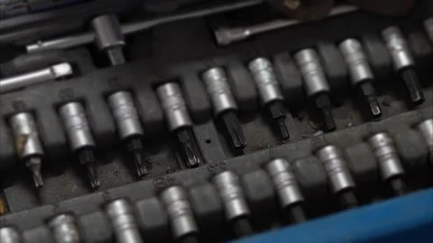 Various screwdriver bits and hex sockets inside a tool organizer. 動画素材 343892359