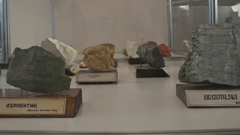 Various semi precious rocks displayed on exhibition Stock Photos
