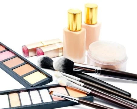 Various set of professional makeup brushes and cosmetics and palette of colou Foto stock