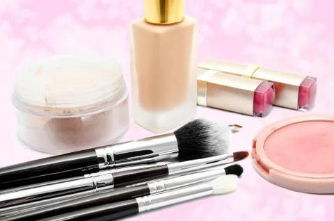 Various set of professional makeup brushes and cosmetics and palette of colou Stock Photos