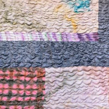 Various sewn pieces of patchwork cloth Stock Photos