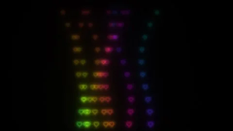 Various shapes and colors appear against a dark backdrop Stock Footage 338205850