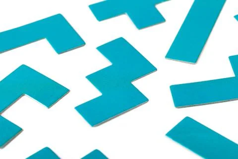 Various shapes, blue puzzle elements, pattern, white background abstract Foto stock