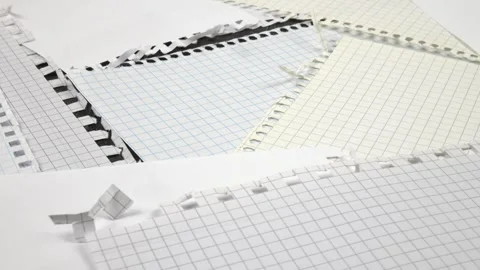 Various sheets of spring-bound notebooks lie on a table, background Stock Footage 336507682