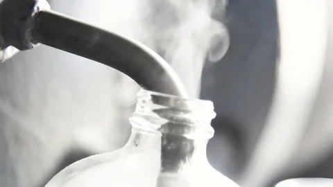 Various shots depict the mixing and refueling of fighter jets aboard an aircraft Stock Footage
