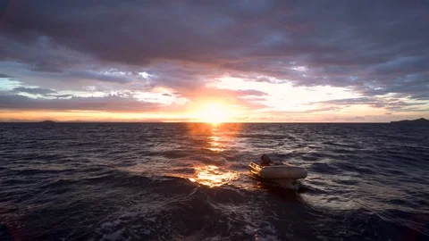 Various shots of an inflatable boat, zodiac, tender or dinghy being pulled behin 動画素材 101667494