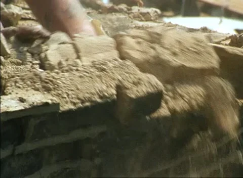 Various shots of men pulling down houses in east London, United Kingdom Stock Footage 159722355