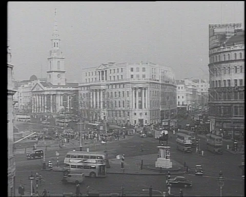 Various shots of people walking down streets and commuting to work, London 1955 Stock Footage 143464414
