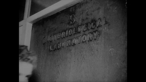 Various shots of scientists doing tests in a lab, UK 1946 Stock Footage 133387493