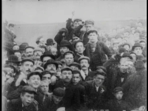 Various shots of spectators at Everton vs Liverpool football match, UK 1902 Stock Footage 136673678