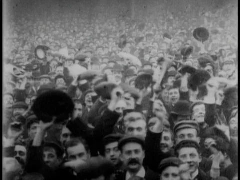 Various shots of spectators at Everton vs Liverpool football match, UK 1902 Stock Footage 136673696