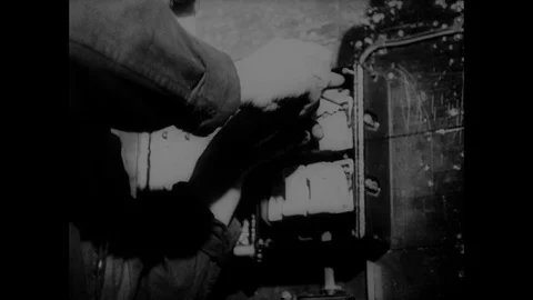 Various shots of young men practicing electric works, Sheffield UK 1946 Stock Footage 133387544