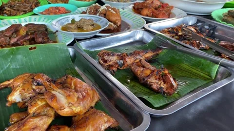 Various side dishes are sold at food stalls in Indonesia. Stock Footage 278903789