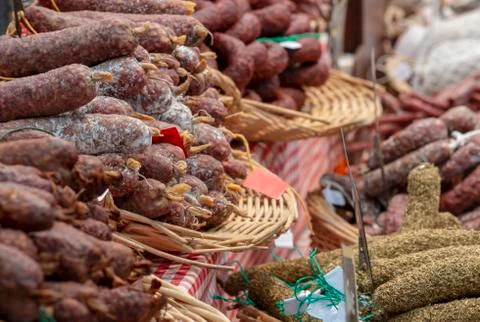 Various siro dried sausages on the counter Stock Photos