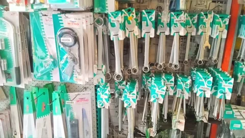 Various-sized spanners showcased at a mechanical equipment store Stock Footage 260882252