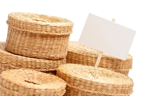 Various Sized Wicker Baskets with Blank Sign Isolated on White. Stock Photos