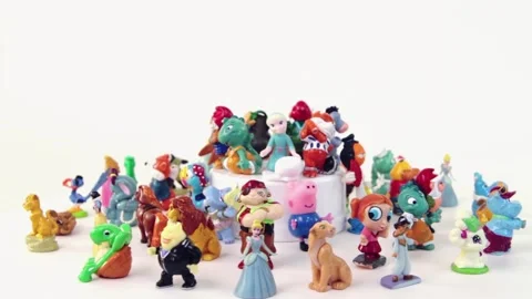 Various small colorful toys on the light background Stock Footage 326070353
