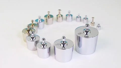 Various small polished weights for exact analytics are arced Stock Footage 310058603