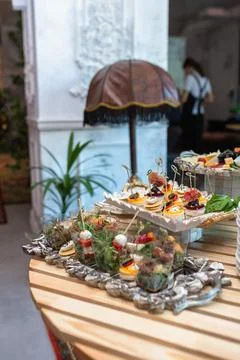 Various snacks and drinks on the table at the event Stock Photos