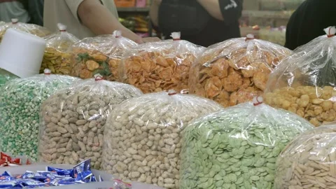 Various snacks sold on the roadside in glodok pancoran chinatown jakarta Stock Footage 326306761