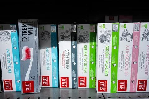 Various Splat toothpaste products displayed on a store shelf Stock Photos