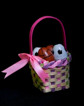 Various Sport Eggs In A Easter Basket 写真素材