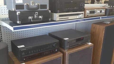 Various Stereo Receivers Available for Purchase - Pawn Shop Stock Footage 140778466