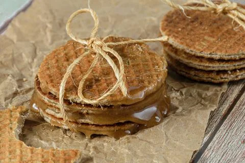 Various stroopwafel with sisal rope loop and melted glucose syrup. Stock Photos