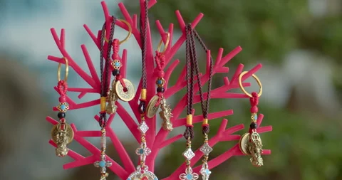 Various styles of keychains Sold inside the temple. Stock Footage 282382373