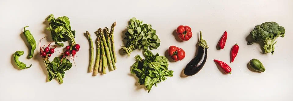 Various summer fresh vegetables layout over plain white background Stock Photos