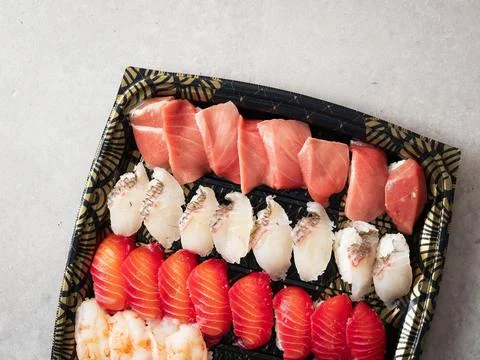 Various sushi on a plate for packaging Foto stock