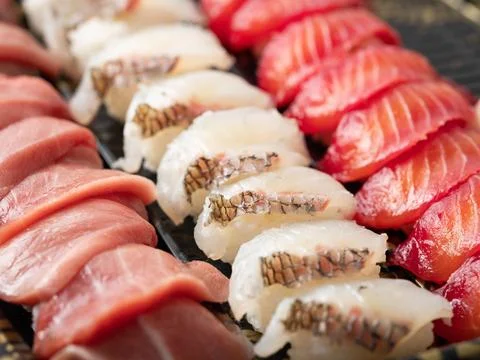 Various sushi on a plate for packaging Stock Photos