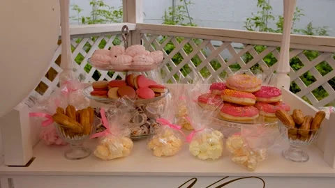 Various sweets on banquet table Stock Footage 133927455