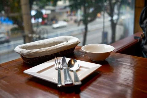 Various tableware on the table in the western restaurant Fotos de archivo