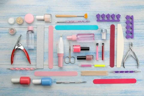 Various tools and things for manicure and pedicure on a blue background. vi.. Stock Photos