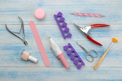 Various tools and things for manicure and pedicure on a blue background. vi.. Foto stock
