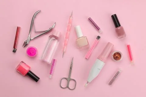 Various tools and things for manicure and pedicure on a pink background. vi.. Stock Photos