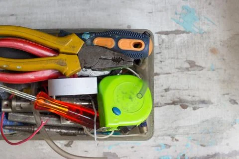 Various tools in the box, on white background Stock Photos
