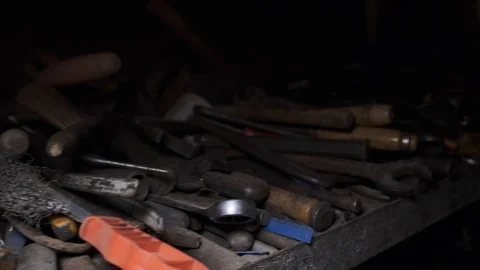 Various tools on an old factory shelf, garage table - industrial theme. Closeup Stock Footage 126491029