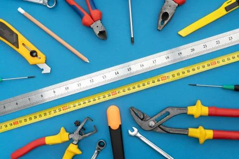 Various tools for repair, a tool kit for the home, on a blue background, safe 写真素材