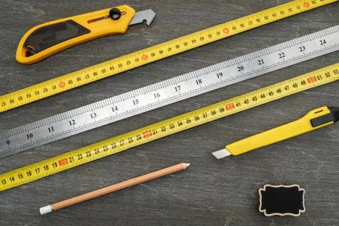 Various tools for repair, a tool kit for the home, on a vintage wooden backgr Stock Photos
