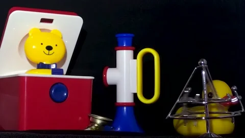 Various Toys on a Black Background Video stock 238024702