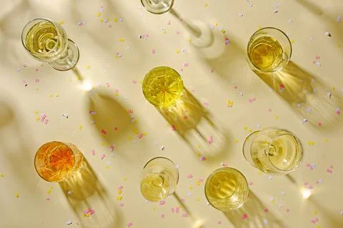 Various translucent glasses filled with white wine Foto stock