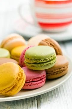 Various type of macaroons on plate Stock Photos