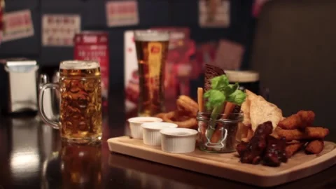 Various types of beer and snacks for it. Stock Footage 144219620